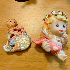 Baby girl statues wide eye